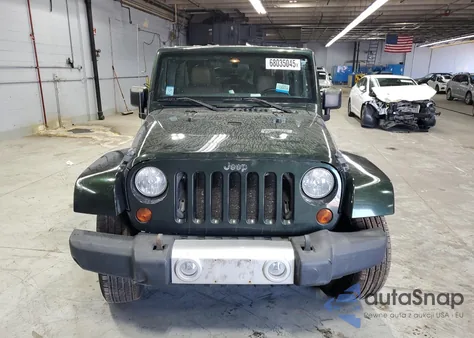 2011 Jeep Wrangler Unlimited Sahara z USA, uszkodzony, nr VIN 1J4HA5H12BL516222